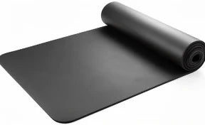 TPE yoga mat partially unrolled showing dual-texture surface