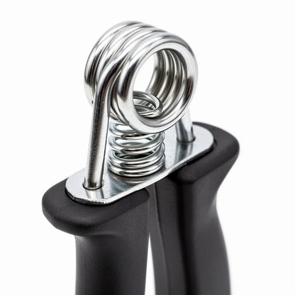 Close-up of a hand grip strengthener spring and handle